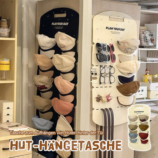 Hatten henger i vesken bak døren 🌟🎩