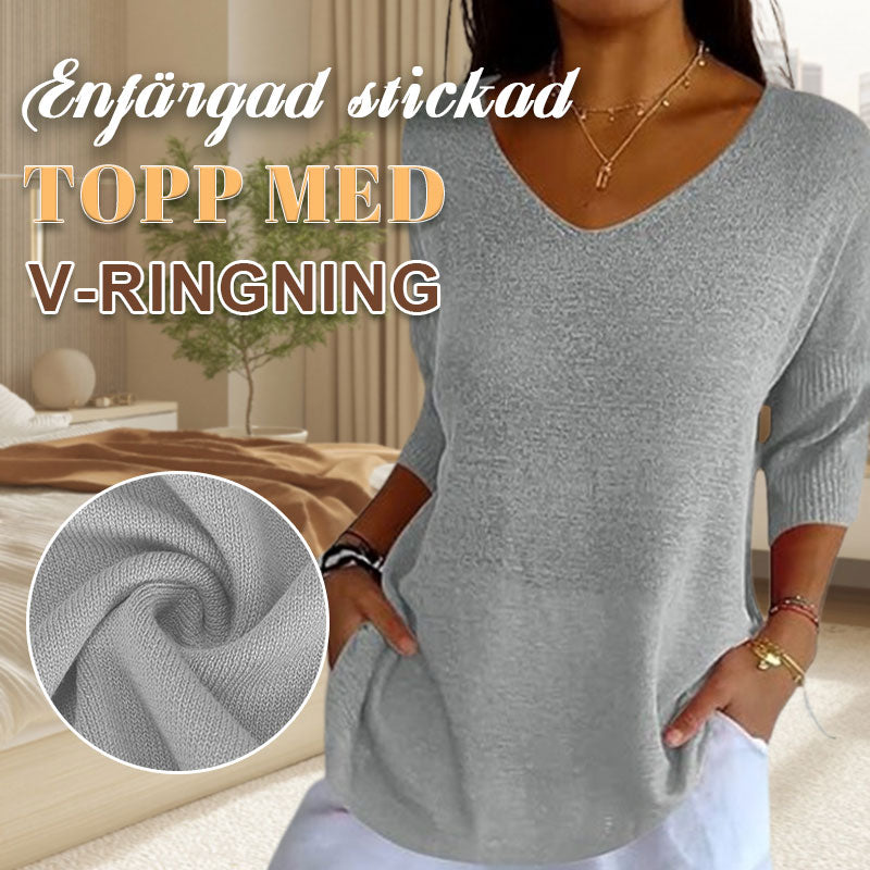 Ensfarget strikket topp med v-hals