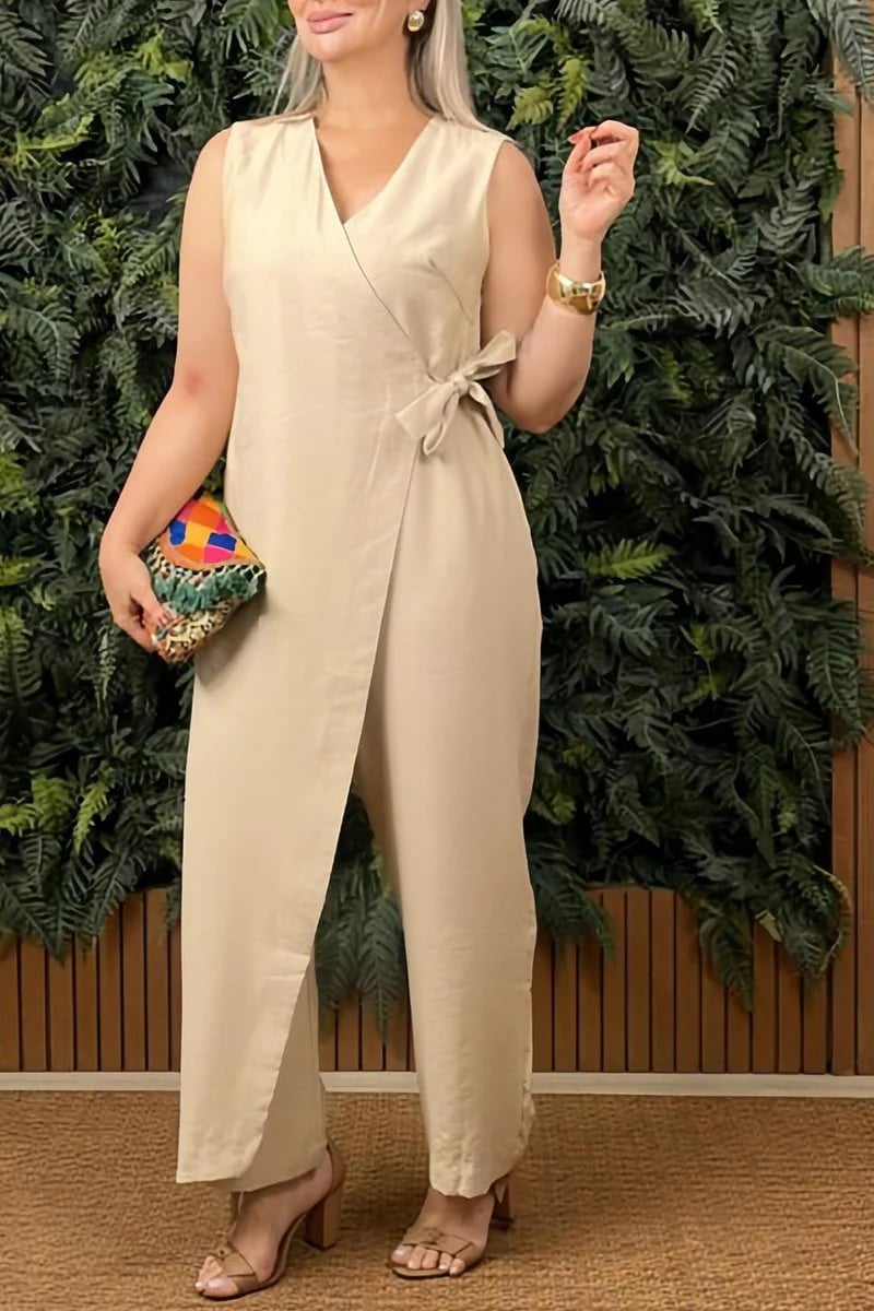 Uformell jumpsuit med V-hals og korsstropper for kvinner