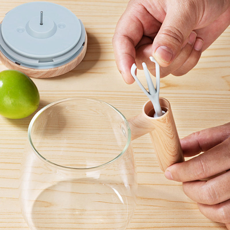Helautomatisk kaffekopp med rørepinne